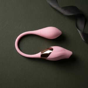 Pink silicone intimate device on surface