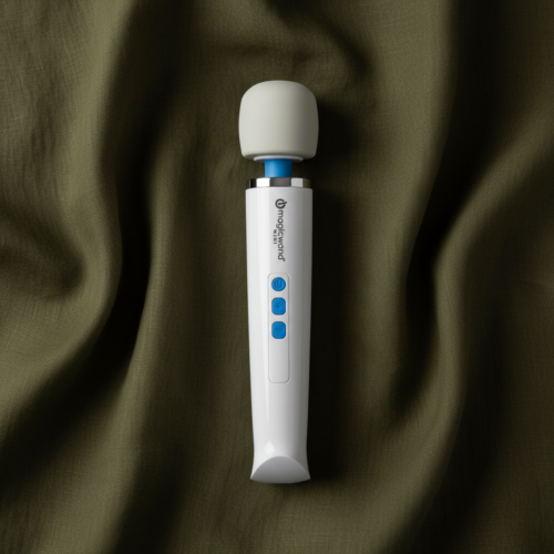 White Magic Wand Mini massager with three blue control buttons, standing upright on rumpled olive green fabric.