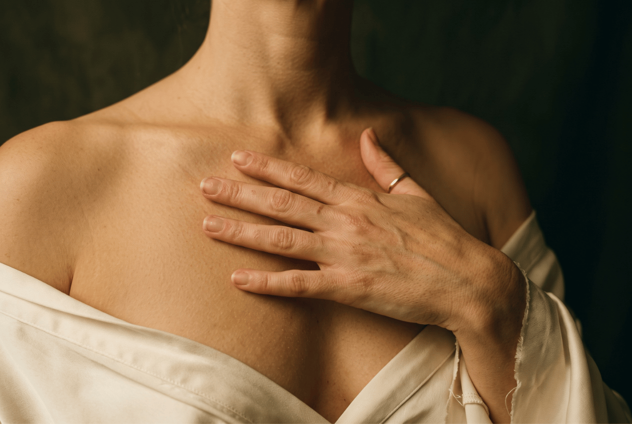 Hand on chest, soft lighting, calm